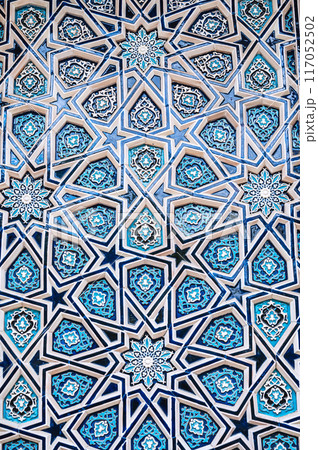 ceramic tile uzbek mosaic with Arabic Islamic pattern decorated with blue and white starry ornament with stars 117052502