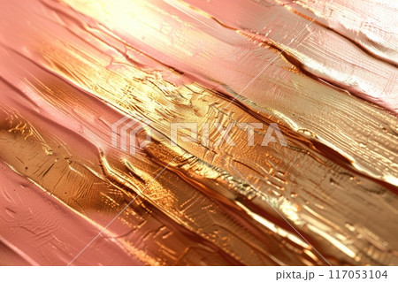 A gold and pink color palette with a brush stroke texture 117053104