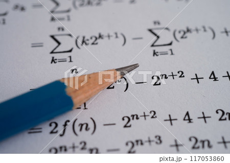 Pencil on mathematic formula exercise test paper in education school. Pencil on mathematic formula exercise test paper in education school. 117053860