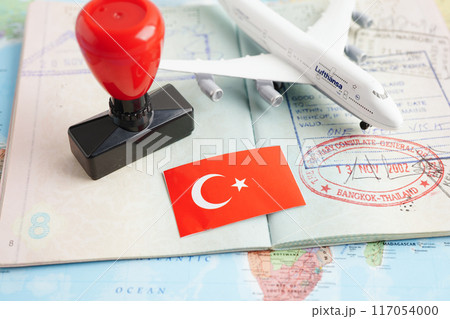 Bangkok, Thailand December 10, 2023 Turkey Visa and passport document to immigration at airport in country. 117054000