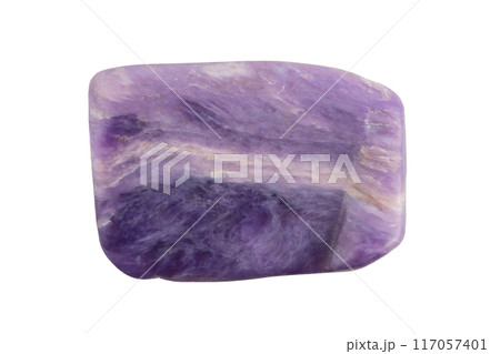 natural violet charoite gem on the white isolated background 117057401
