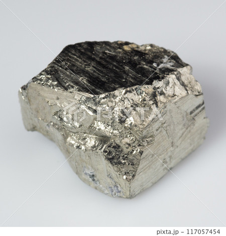 natural silver pyrite gem on the white background natural silver pyrite gem on the white background 117057454