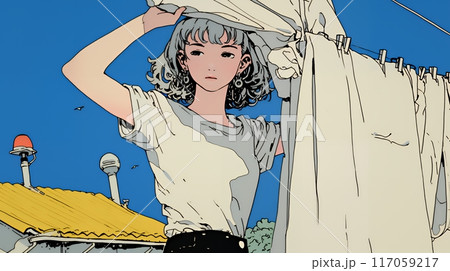 洗濯物を干している若い女性