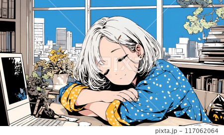 机にうつ伏せになって、幸せそうな寝顔で眠っている若い女性