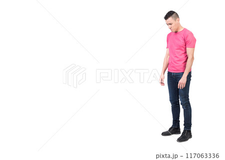 Discontent man standing in studio. White background 117063336