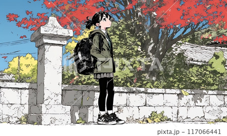 紅葉の道を通学する女子高生