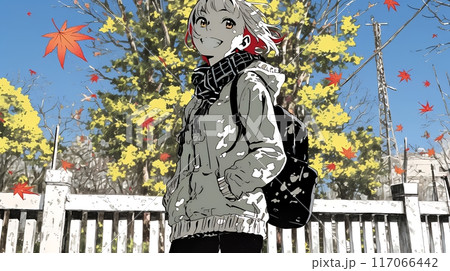 紅葉の道を通学する女子高生