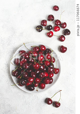 red cherry, cherry berry, scattered on a plate, top view, no people, red cherry, cherry berry, scattered on a plate, top view, no people, 117068874