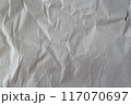 Recycled wrinkled white paper close up texture 117070697