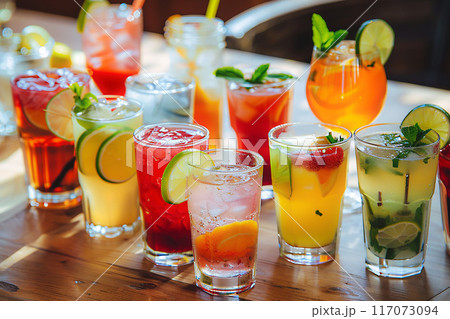 Array of summer cocktails, served chilled on a bar table, Array of summer cocktails, served chilled on a bar table, 117073094
