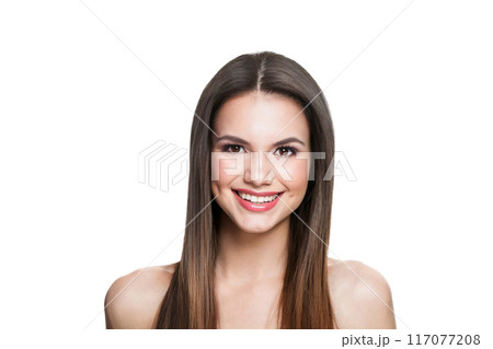 Nice woman with long hair and fresh clean skin studio portrait on grey background. 117077208