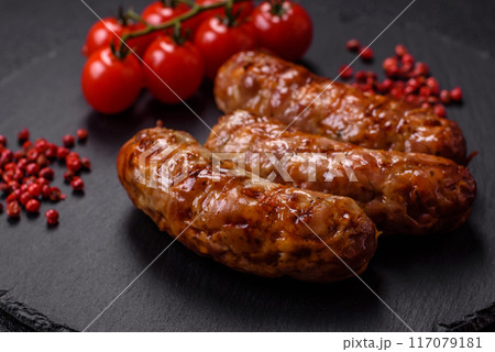 Grilled pork or chicken sausages with salt, spices and herbs 117079181