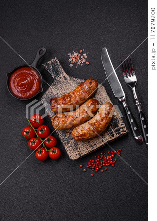 Grilled pork or chicken sausages with salt, spices and herbs Grilled pork or chicken sausages with salt, spices and herbs 117079200