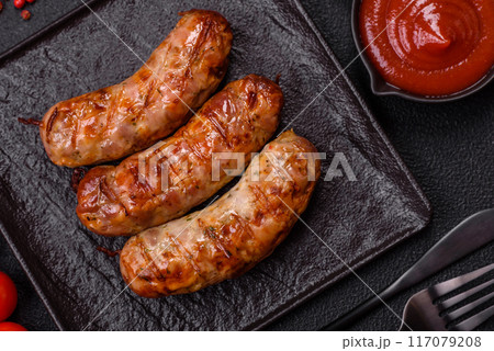 Grilled pork or chicken sausages with salt, spices and herbs Grilled pork or chicken sausages with salt, spices and herbs 117079208