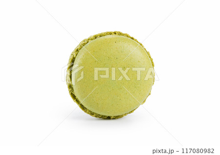 green macaron with jam isolated on white green macaron with jam isolated on white 117080982