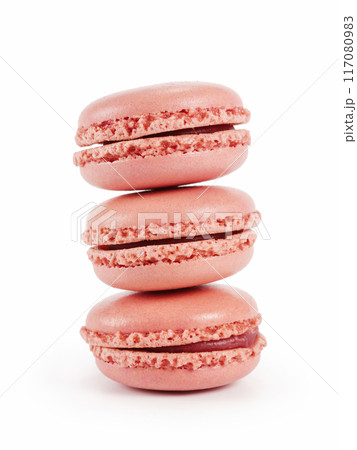 three pink macarons isolated on white three pink macarons isolated on white 117080983