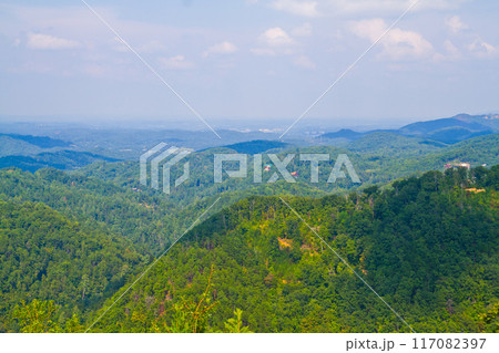 Panoramic View of Lush Woodlands with Rural Settlements in Gatlinburg, Tennessee Panoramic View of Lush Woodlands with Rural Settlements in Gatlinburg, Tennessee 117082397