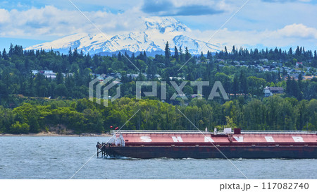 Aerial View of Red Barge on Columbia River with Mount Hood Background Aerial View of Red Barge on Columbia River with Mount Hood Background 117082740