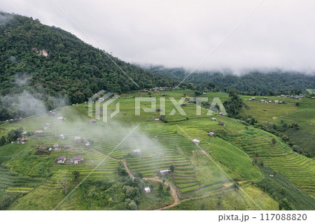 Aerial views of Small house and rice terraces field at pabongpaing village rice terraces Mae-Jam Chiang mai, Thailand. The view point for travel. Rice Field Terrace 117088820