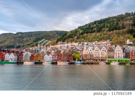 Colorful Bryggen Waterfront with Boats Docked, Bergen, Norway. Colorful Bryggen Waterfront with Boats Docked, Bergen, Norway. 117092189