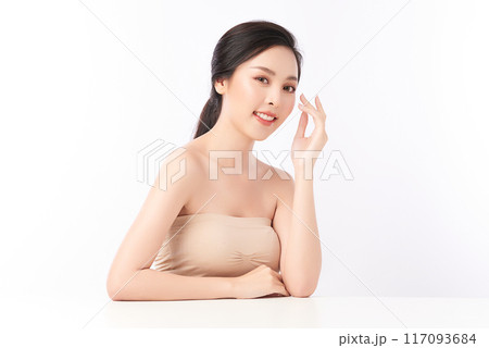 Beautiful young asian woman with clean fresh skin on white background, Face care, Facial treatment, Cosmetology, beauty and spa, Asian women portrait. Beautiful young asian woman with clean fresh skin on white background, Face care, Facial treatment, Cosmetology, beauty and spa, Asian women portrait. 117093684