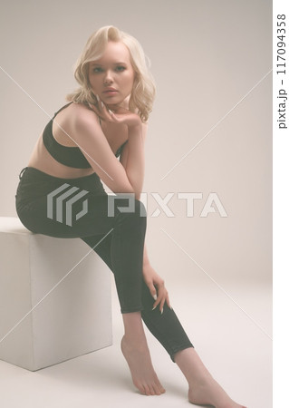 Modern version of Marilyn Monroe in sexy black lingerie Modern version of Marilyn Monroe in sexy black lingerie 117094358