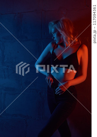 Alluring woman in underwear in colorful studio 117094361