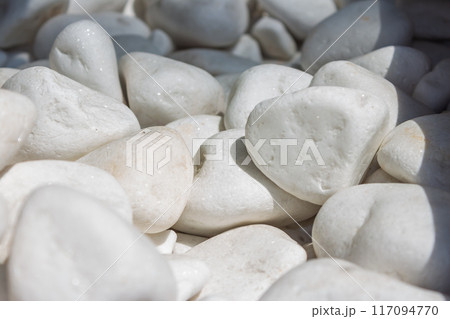 Decorative stones in the rays of sunlight Decorative stones in the rays of sunlight 117094770