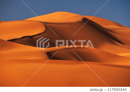 Merzouga, Morocco. Sand dunes in the Sahara Desert, North Africa - Erg Chebbi dunes. 117095844