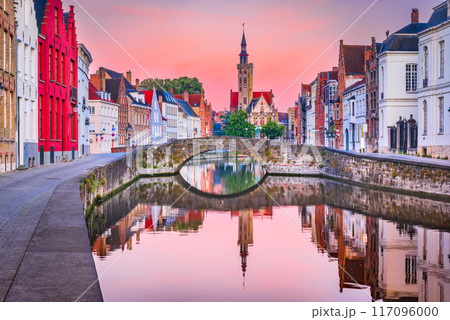 Bruges, Belgium,  Flanders. Beuatiful Spiegelrei Canal, famous in Brugge city, sunrise colors. 117096000