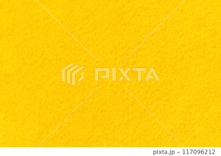 Closeup image of felt texture background fabric material illustration wallpaper mustard yellow color Closeup image of felt texture background fabric material illustration wallpaper mustard yellow color 117096212