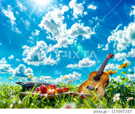 Ukulele sitting in the grass next to basket of fruit. Ukulele sitting in the grass next to basket of fruit. 117097287