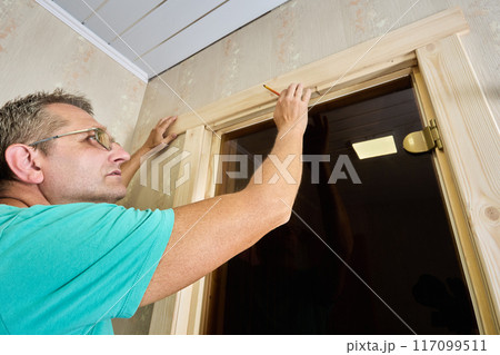 Door frame marking before jamb and trim installing. Door frame marking before jamb and trim installing. 117099511