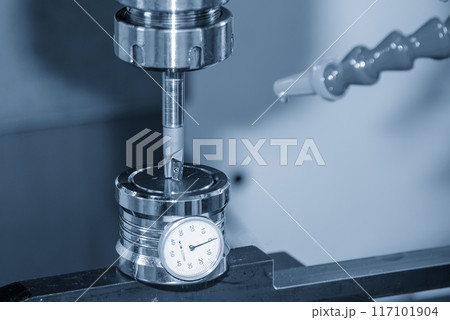 The tool length measurement operation with dial gauge for CNC milling machine. 117101904
