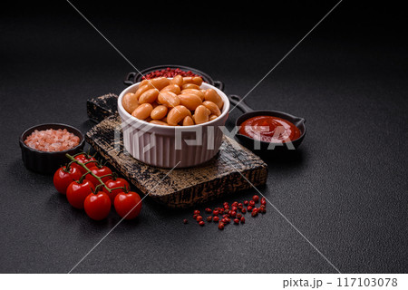 Delicious nutritious canned beans in tomato, with salt and spices 117103078