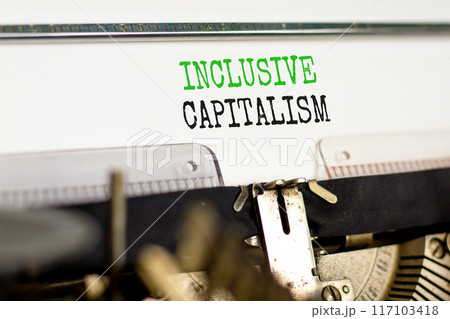 Inclusive capitalism symbol. Concept words Inclusive capitalism typed on beautiful old retro typewriter. Beautiful white paper background. Business inclusive capitalism concept. Copy space. 117103418
