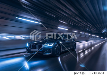 Sleek black luxury sedan races through a motion-blurred tunnel, showcasing speed and elegance 117103681
