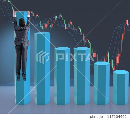 Businessman hanging from bar chart in business concept Businessman hanging from bar chart in business concept 117104462
