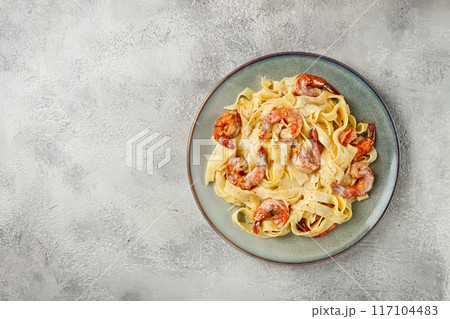 tagliatelli with shrimp, in cream sauce, with parmesan cheese, homemade, no people, in tagliatelli with shrimp, in cream sauce, with parmesan cheese, homemade, no people, in 117104483