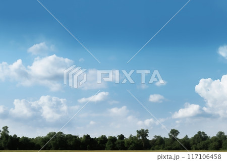 Beautiful summer landscape as a background, blue sky with white clouds above the treetops on a bright day, beautiful nature 117106458