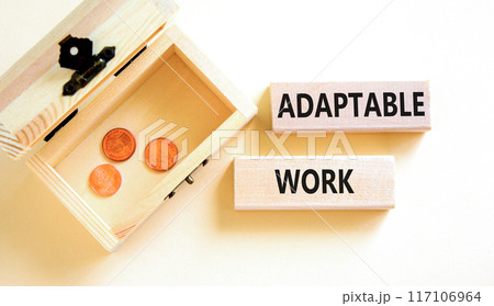 Adaptable work symbol. Concept words Adaptable work on beautiful wooden block. Beautiful white paper background. Wooden chest with coins. Business Adaptable work concept. Copy space. 117106964