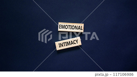 Emotional intimacy symbol. Concept words Emotional intimacy on beautiful wooden blocks. Beautiful black table black background. Psychology emotional intimacy concept. Copy space. 117106986