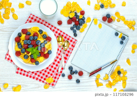 breakfast of cornflakes and berries 117108296