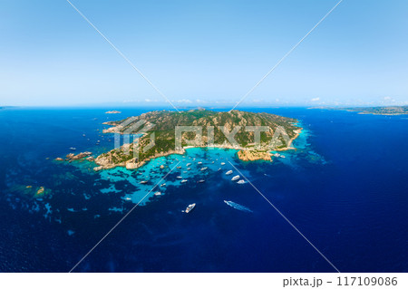 Island in the middle of the sea. Drone view of a yachts, boats and sea bay.  117109086