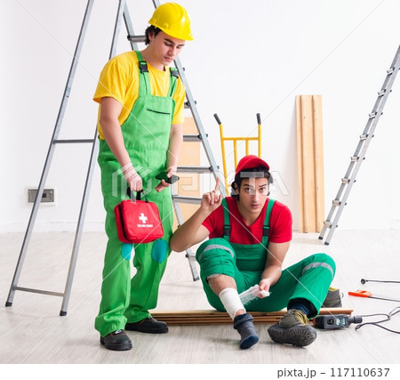 Injured worker and his workmate Injured worker and his workmate 117110637
