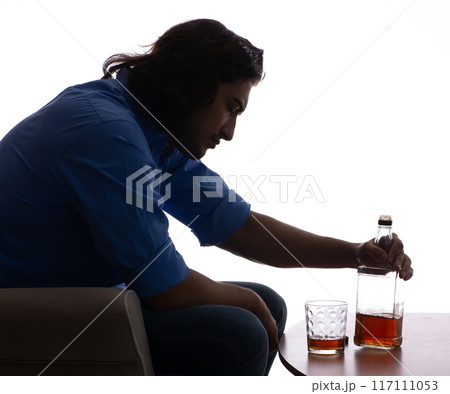 Young man suffering from alcoholism 117111053