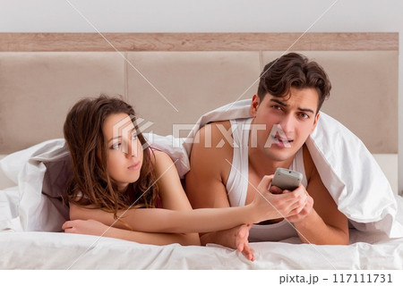 Family conflict with wife husband in bed 117111731