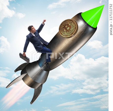 Businessman flying on rocket in bitcoin price rising concept 117111732