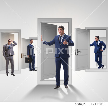 Businessman in uncertainty concept with many doors Businessman in uncertainty concept with many doors 117114032