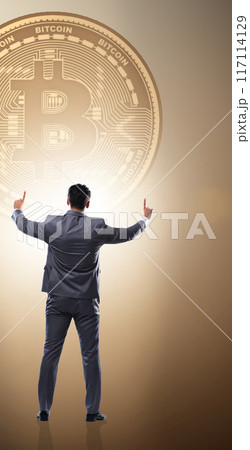 Businessman walking towards bitcoins in cryptocurrency blockchai 117114129